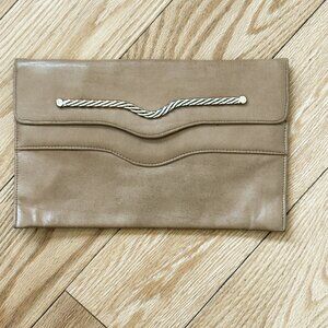 4.	Butternut-color, envelope-style clutch purse with gold-colored metal trim